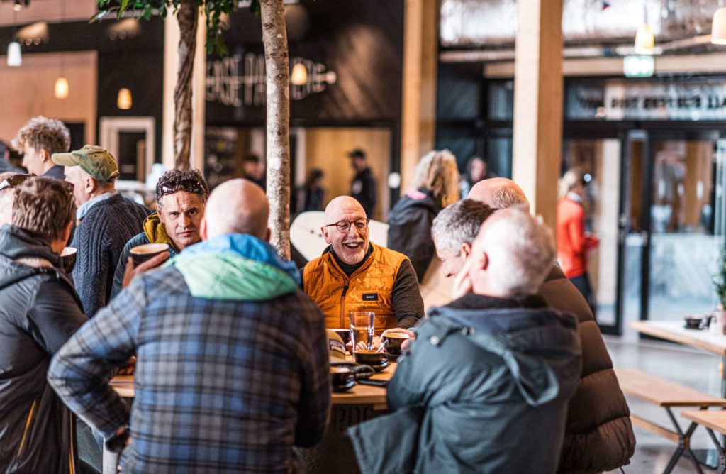 People sitting down having a good time at the Wave bar in Bristol