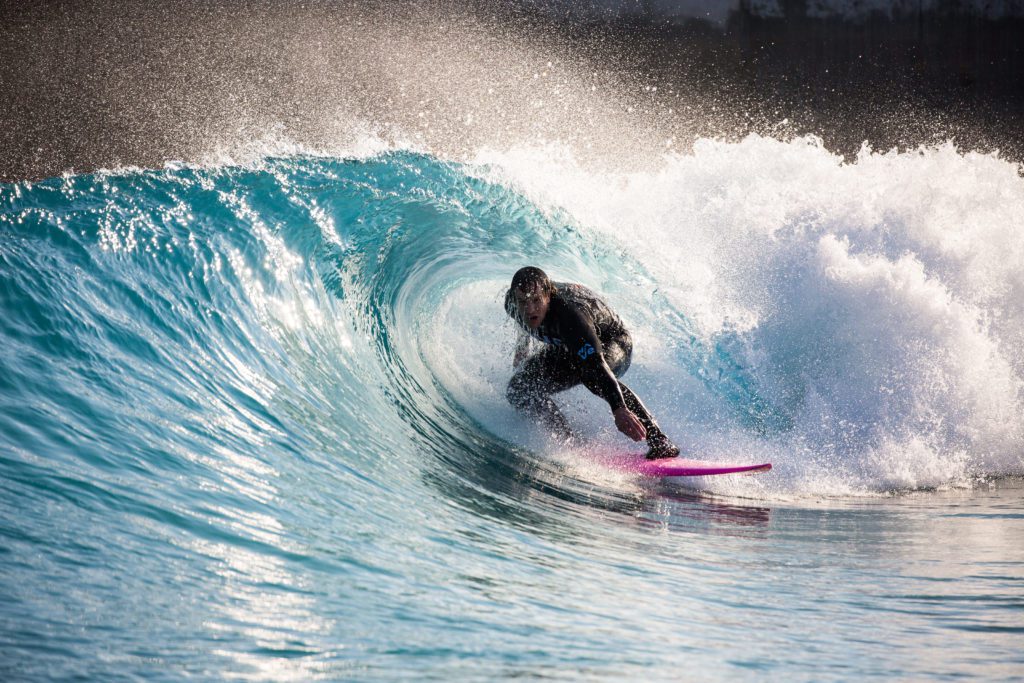 Surfer getting barrelled at The Wave, wavepool in Bristol