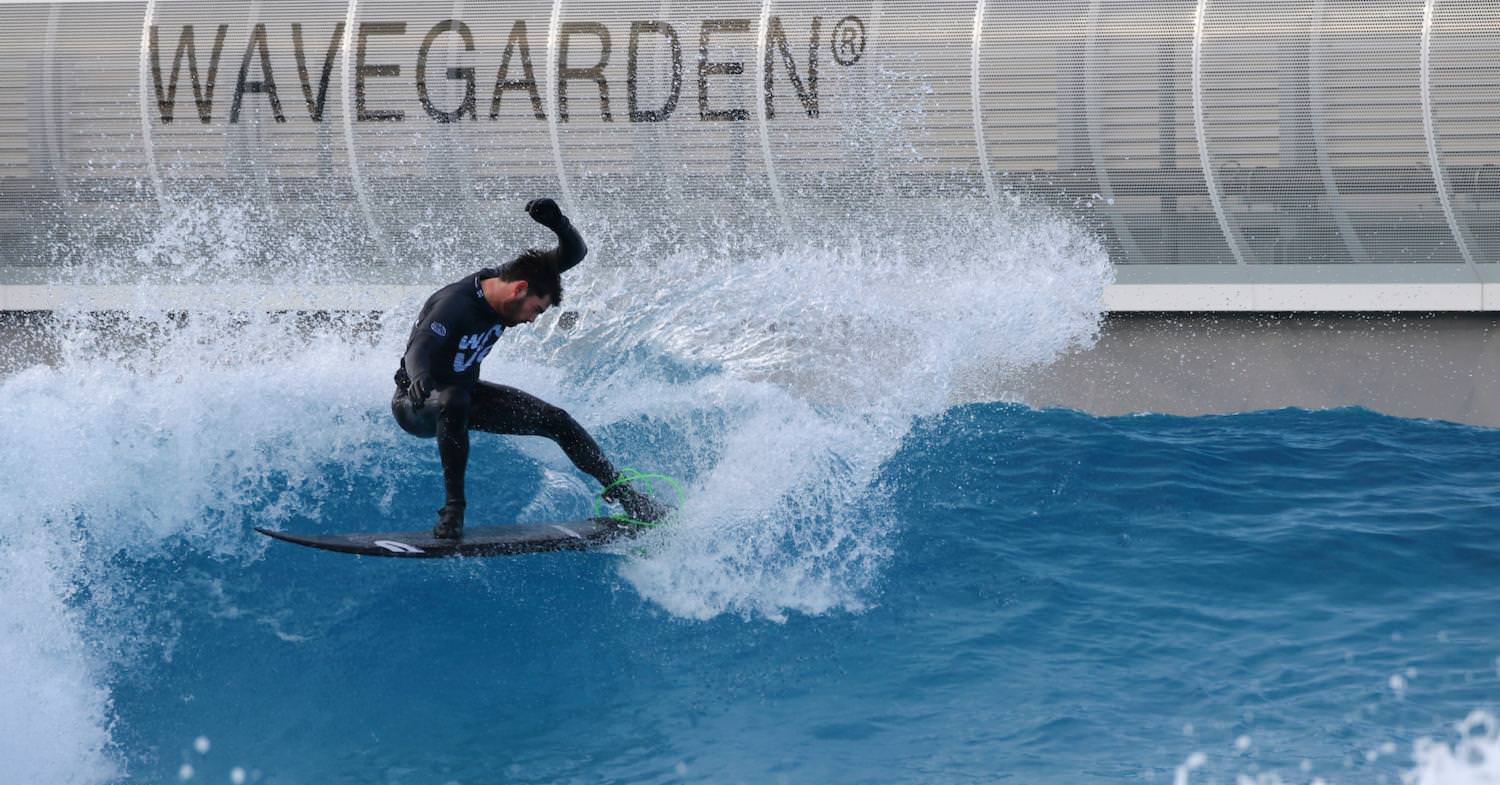 Surfer shredding at The Wave, inland surfing lake near Bristol