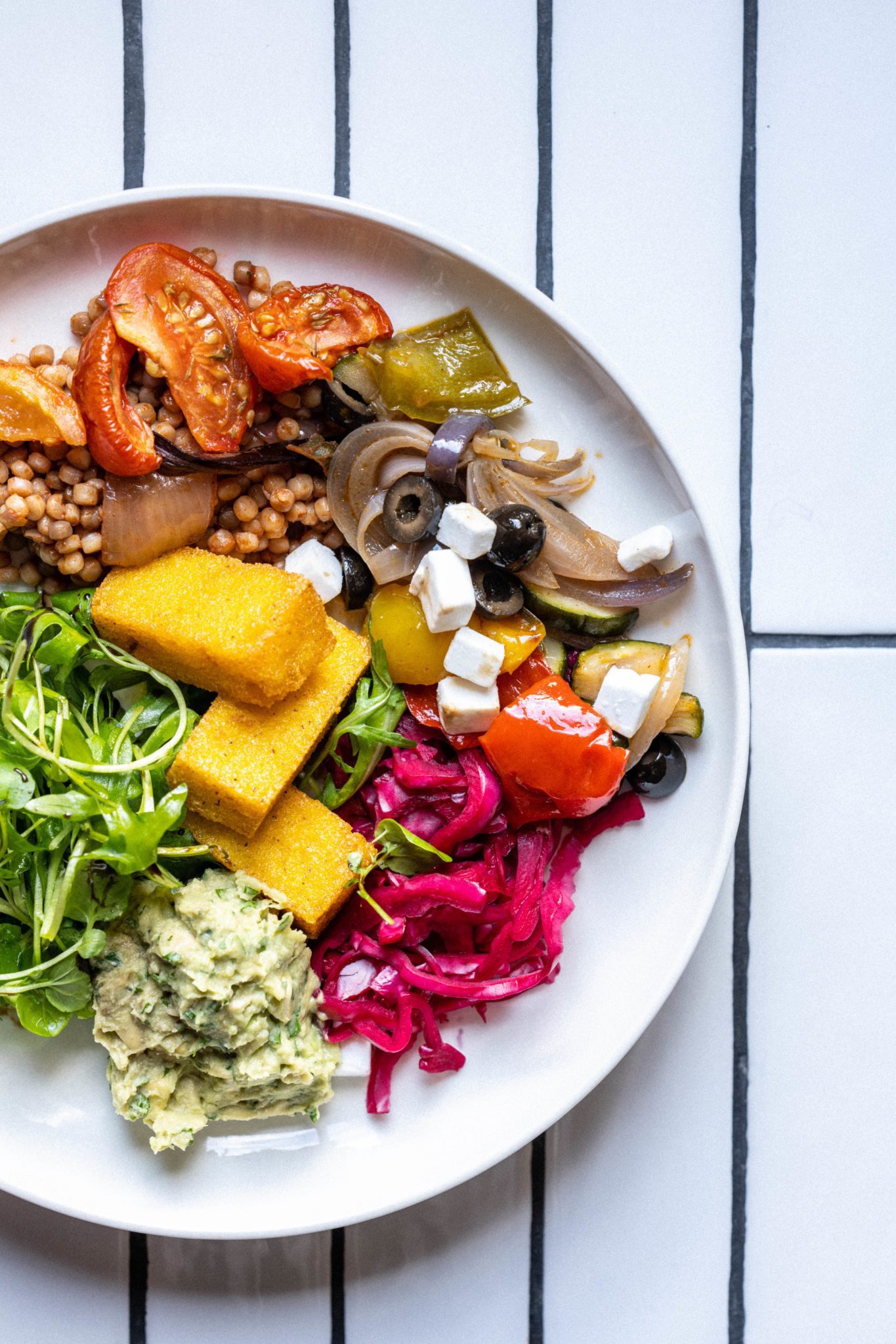 Close up of a salad being served in the Clubhouse cafe bar at The Wave Bristol