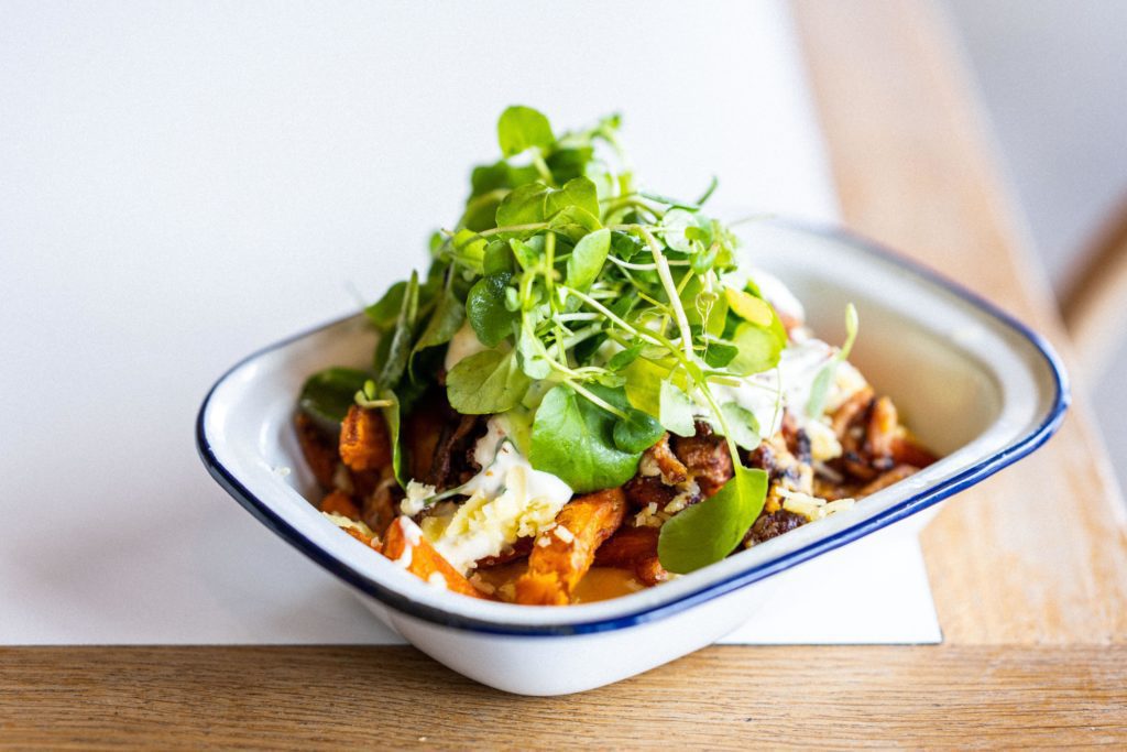 Smoked Pepper Vegetarian Moussaka, Courgette Caponata served at The Wave surfing inland lake near Bristol