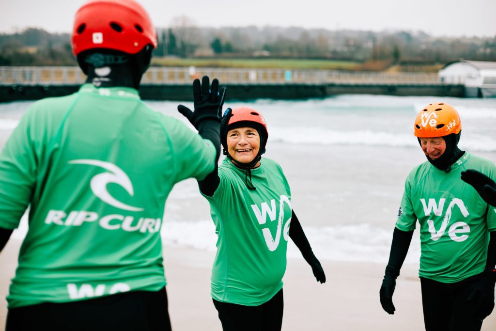 Old people learn to surf as a group at The Wave in Bristol