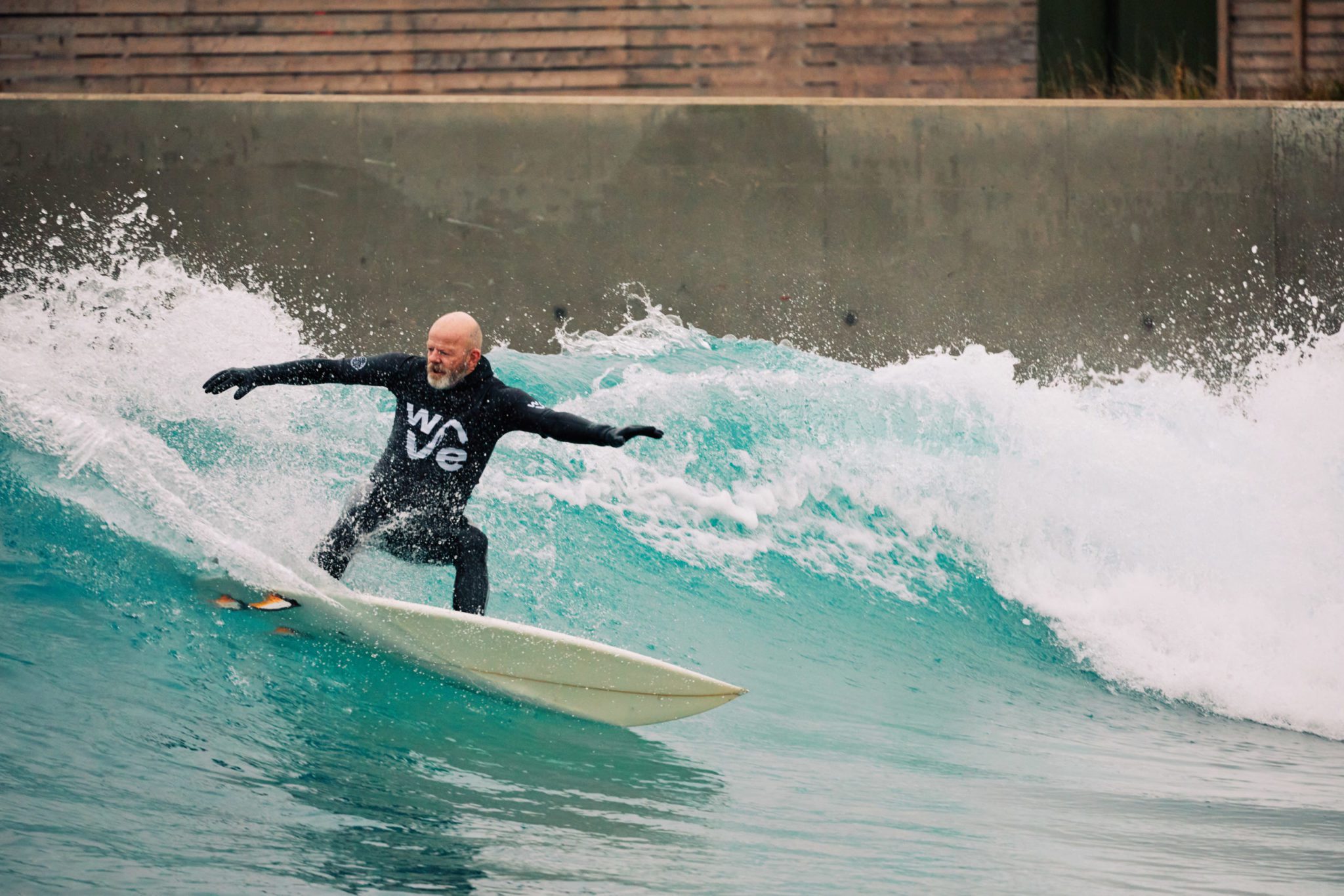 Man enjoying surfing during winter at The Wave in Bristol