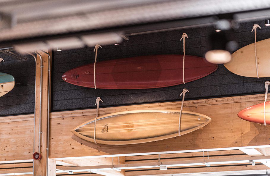 surfboards hanging in The Wave Bristol Clubhouse