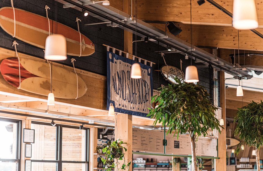 Surfboards hanging in the Clubhouse at The Wave