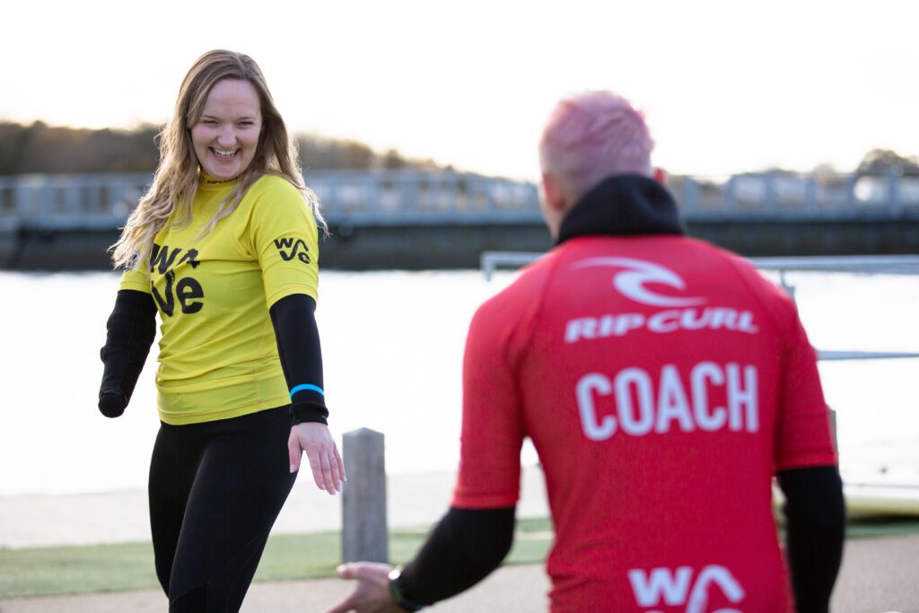 Adaptive surfer having a lesson at The Wave near Bristol