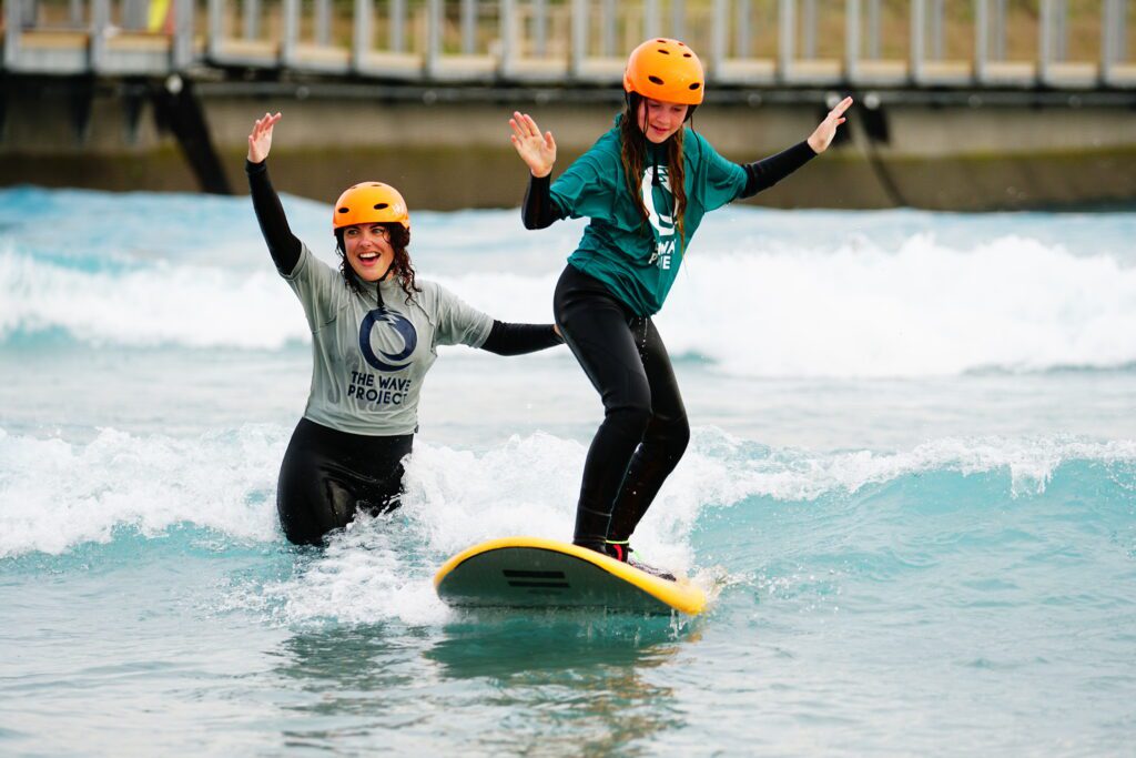 Charity The Wave Project providing beginner surf lessons at The Wave near Bristol