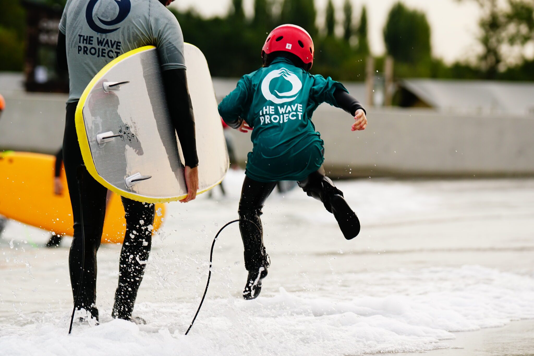 Charity The Wave Project providing beginner surf lessons at The Wave near Bristol