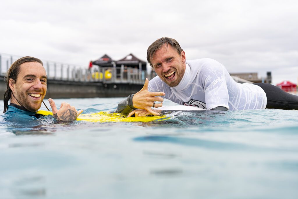 Adaptive surfer in the water at The Wave near Bristol