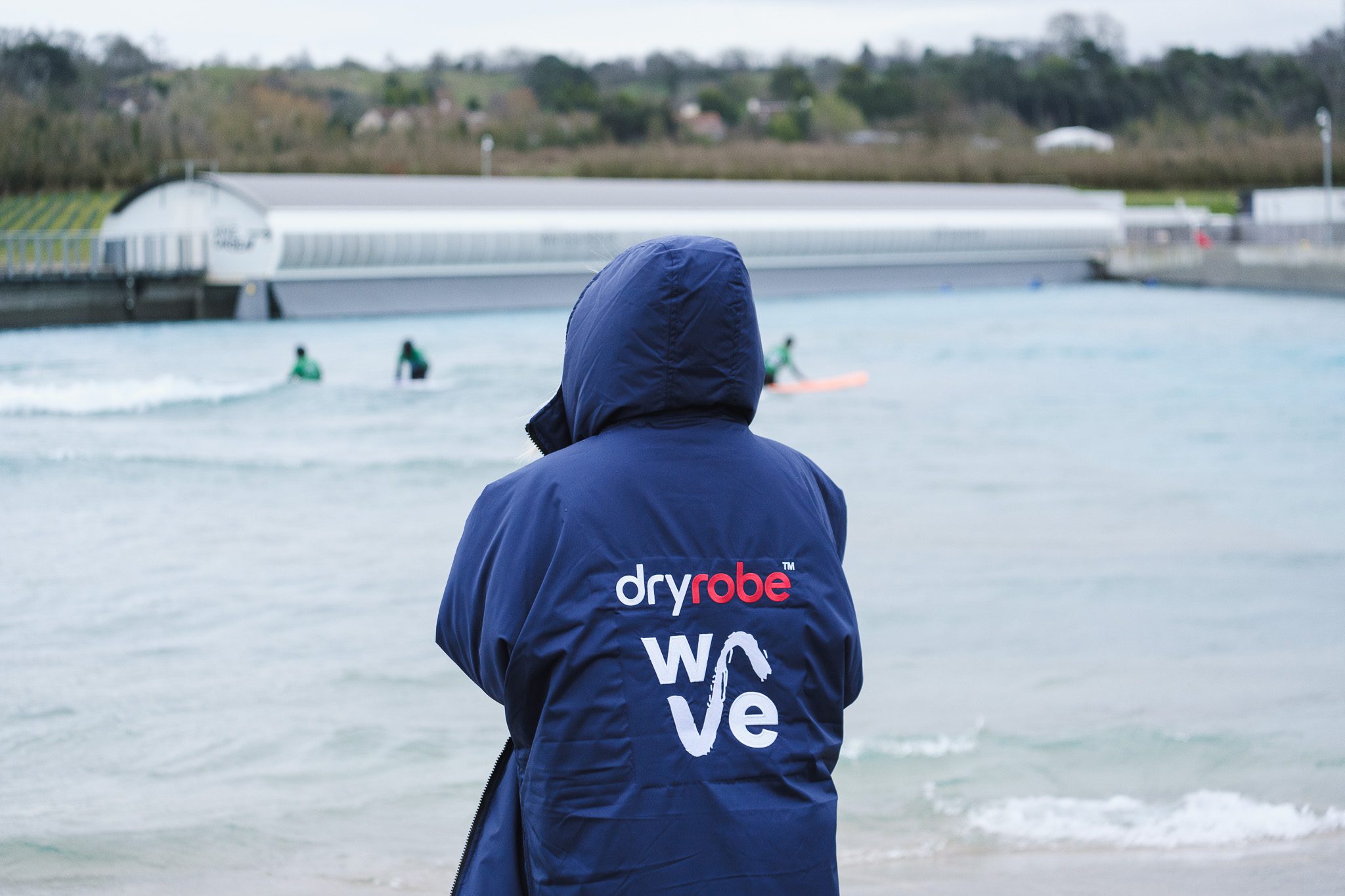 Wavemaker wears a Dryrobe at The Wave