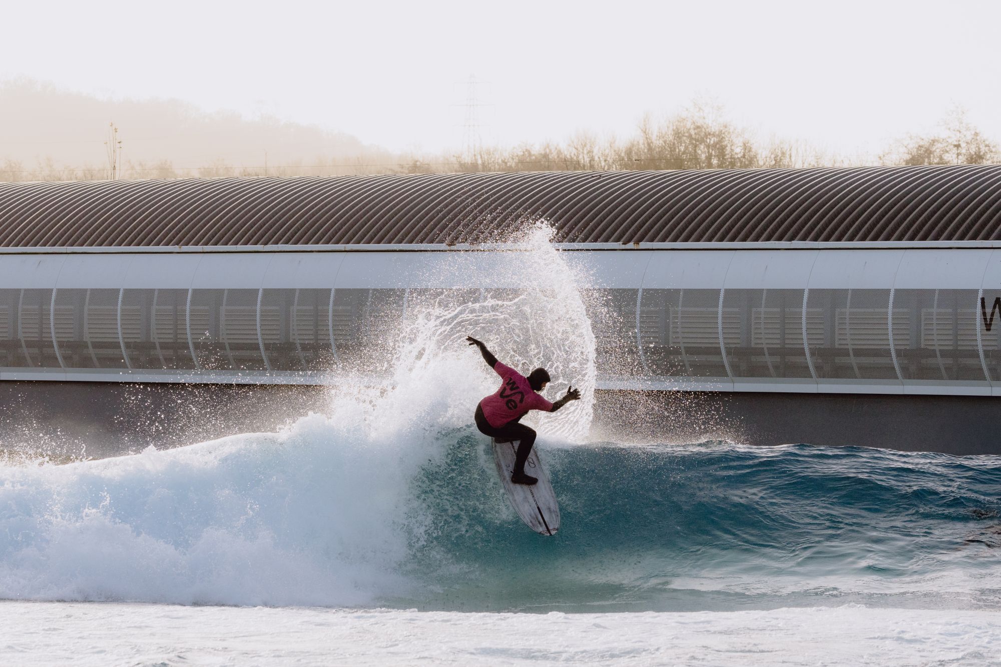 winter surfer at the wave