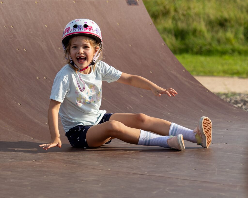 A young girl plays on the skate ramps at The Wave in Bristol