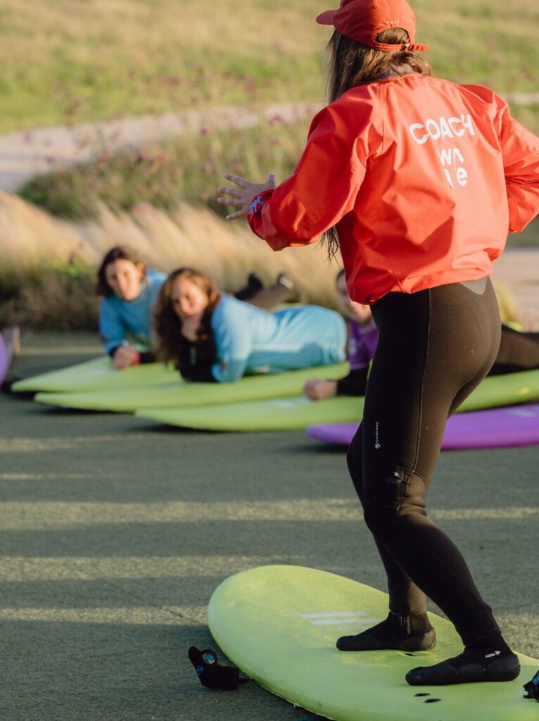 A coach leads a surf lesson at The Wave Bristol.