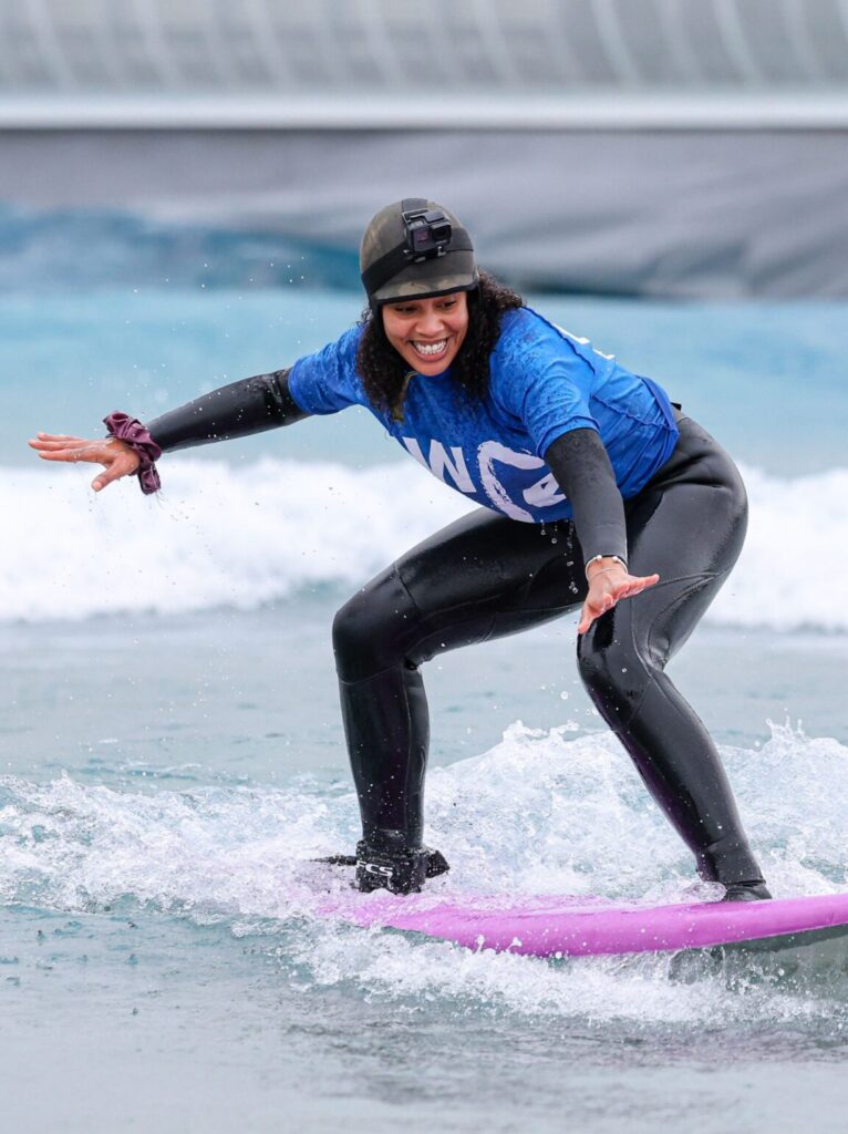 A women riding the whitewater in the Bay of The Wave Bristol