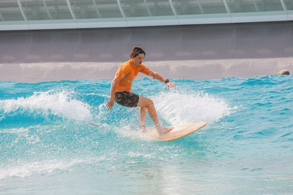 Surfer at The Wave on the advanced session on a sunny day.