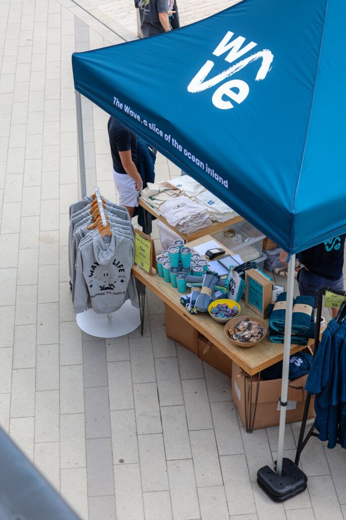 The Wave merchandise stall